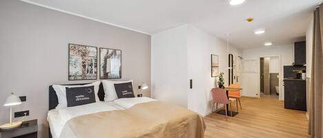 Suite Comfort | 1 dormitori, decoració individual, mobiliari individual i escriptori