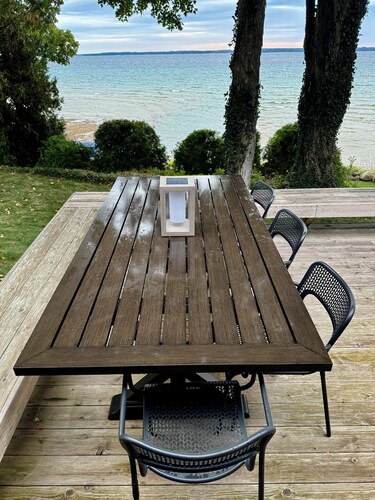 Stunning 150' ft footage on bay, 2 beachfront homes, 5 bedrooms & game room.