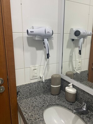 Shower, rainfall showerhead, hair dryer, towels