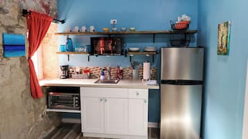 Fridge, microwave, coffee/tea maker, toaster