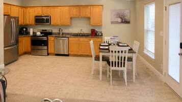 Coffee/tea maker, fridge, microwave, oven
