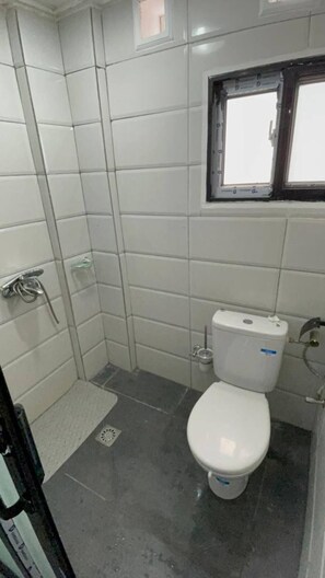 Shower, towels, soap, shampoo