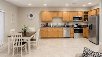 Coffee/tea maker, fridge, microwave, oven