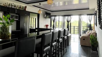 Luxury Apartment | Living area | Flat-screen TV