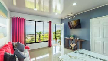 Luxury Suite, 1 Bedroom, Ocean View | Living area