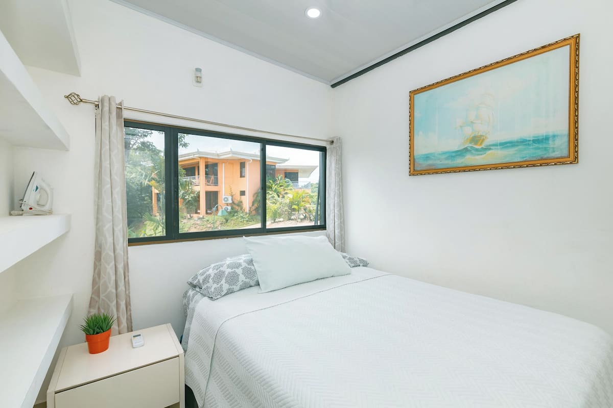 Hypo-allergenic bedding, desk, laptop workspace, iron/ironing board