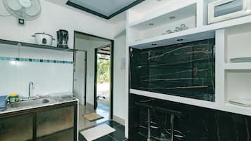 Deluxe Apartment | Private kitchen | Full-sized fridge, microwave, stovetop, rice cooker