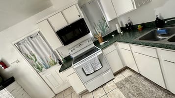 Fridge, microwave, stovetop, coffee/tea maker