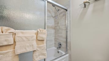 Hair dryer, towels, soap, shampoo