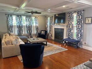 Smart TV, fireplace, DVD player, books