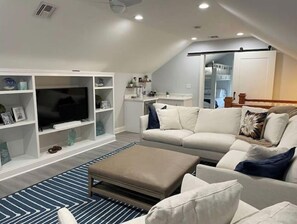 Smart TV, fireplace, DVD player, books