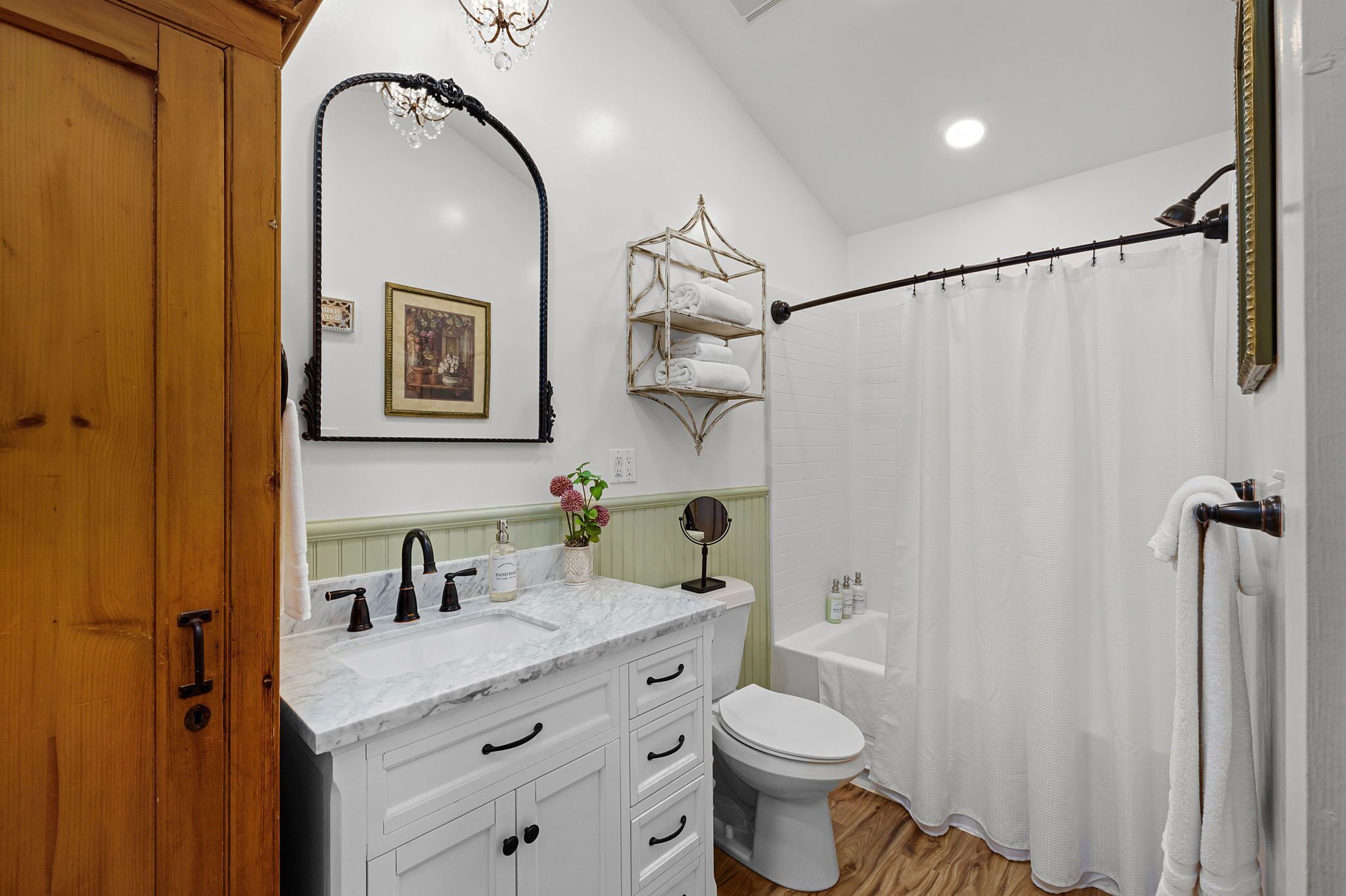 Bathtub, hair dryer, towels, soap