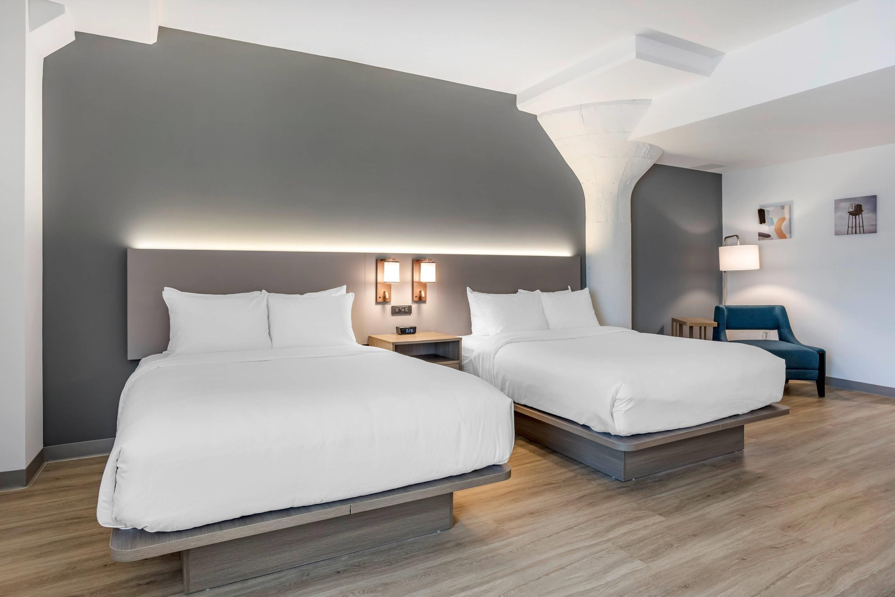 Premium bedding, desk, laptop workspace, blackout curtains