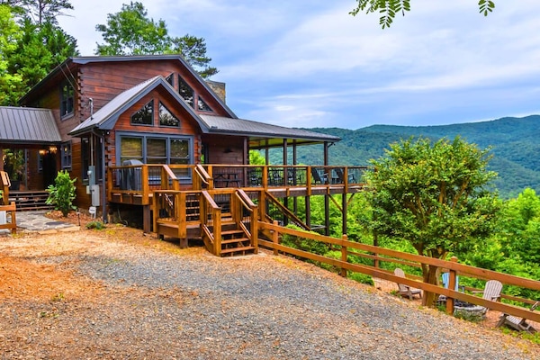 Above the Clouds — a rustic Blue Ridge cabin rental nestled in the North Georgia mountains, offering sweeping mountain views and total seclusion.