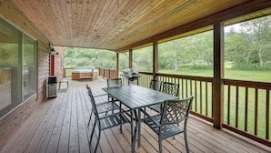 A wooden deck with a table and chairs, a barbecue grill, and a hot tub. - Slaty Fork Home ~ 6 Mi to Snowshoe Mountain Resort (Slaty Fork)