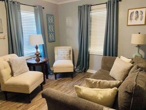 Smart TV, fireplace, DVD player, books