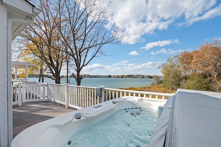 Terrace/patio. Water front Oasis with pickle-ball court and hot tub