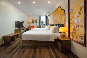 Quarto quádruplo luxo, para não fumantes | Roupas de cama premium, frigobar, cofres nos quartos, escrivaninha
