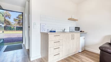 Quarto triplo luxo | Área de estar