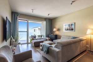 Family Apartment, Multiple Bedrooms, Lakeside (Lake Side Luxury-Steps To The Lake) | Living area | 21-inch TV with cable channels - Lake Side Luxury – Steps to the Lake Lela (Balatonlelle)