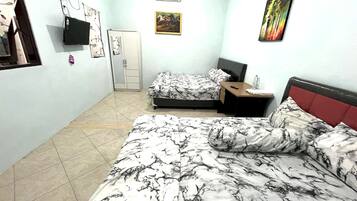 Suite Keluarga | 1 kamar tidur, meja kerja, ruang kerja ramah laptop, dan Wi-Fi gratis