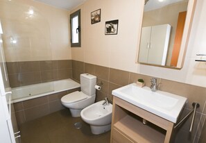 Bañera y toallas