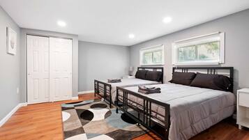 3 bedrooms, desk, iron/ironing board, travel crib