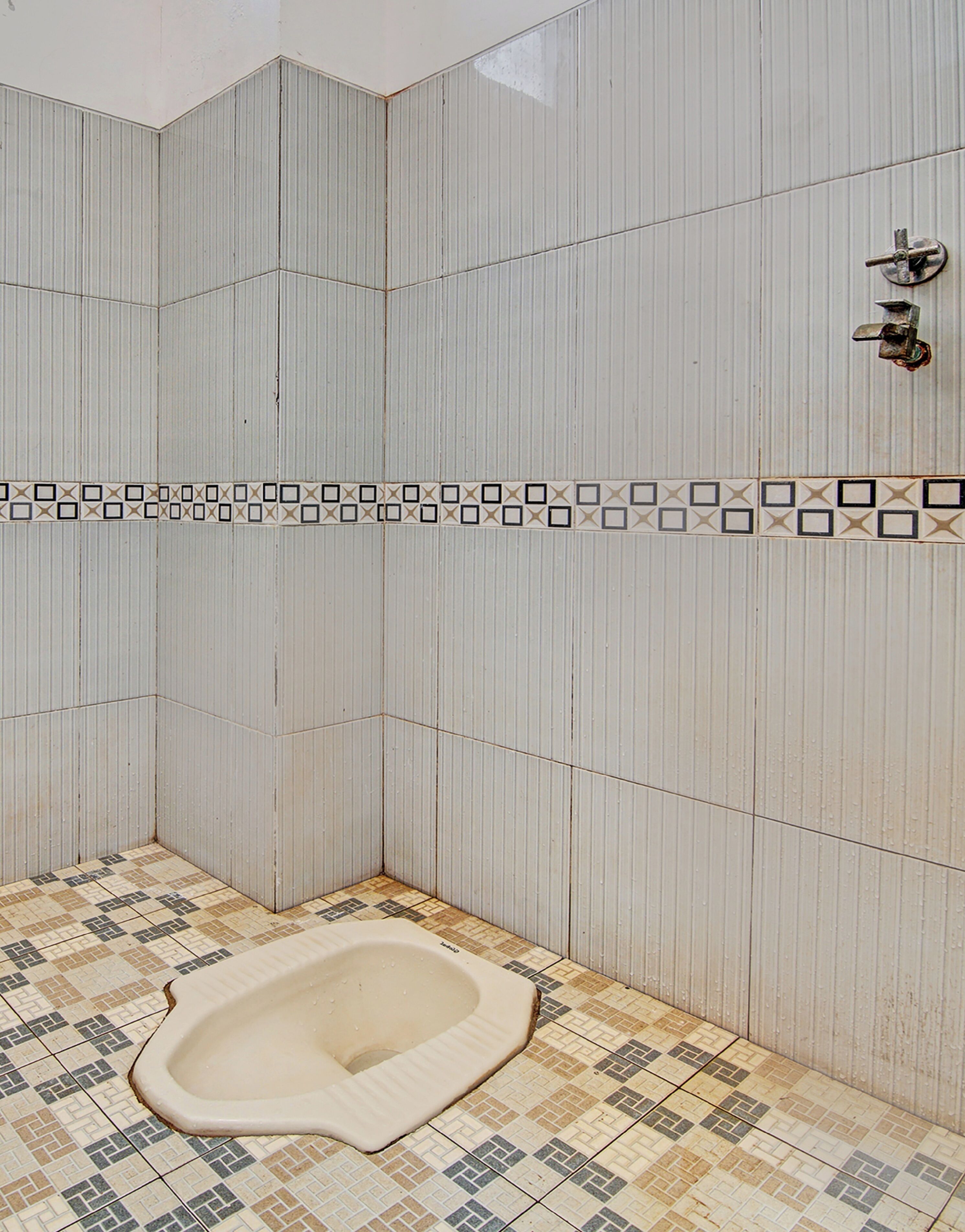 Foto - Hotel O Penginapan Syafira Near Perumahan Mustamindo Permai 1