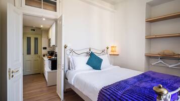 Suite, 1 Bedroom, Balcony, Sea View | In-room safe, iron/ironing board, free WiFi, bed sheets