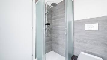 Shower, free toiletries, hair dryer, towels
