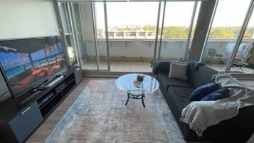 Basic Apartment, 1 Double Bed | Living area | TV
