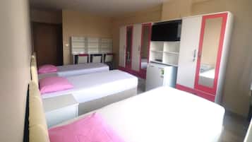 Economy Triple Room, Women only, Non Smoking | Minibar, free WiFi, bed sheets