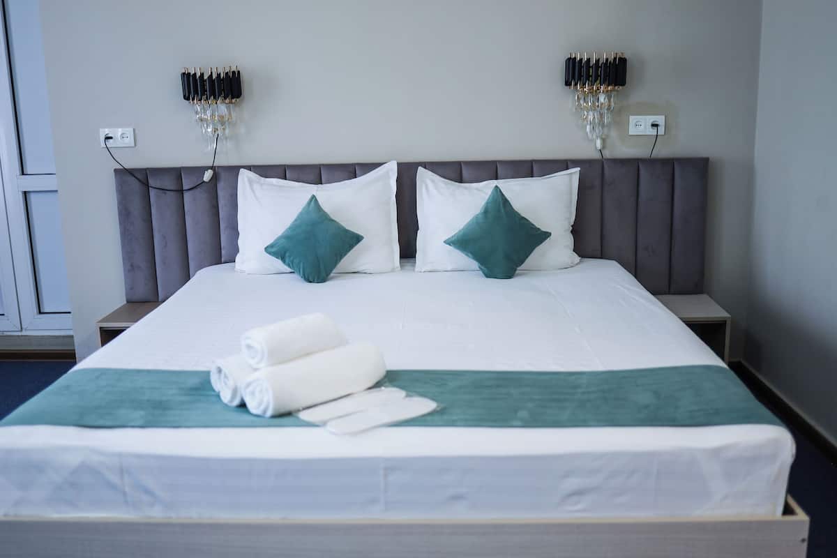 Deluxe Double Room | Laptop workspace, blackout curtains, iron/ironing board (on request)