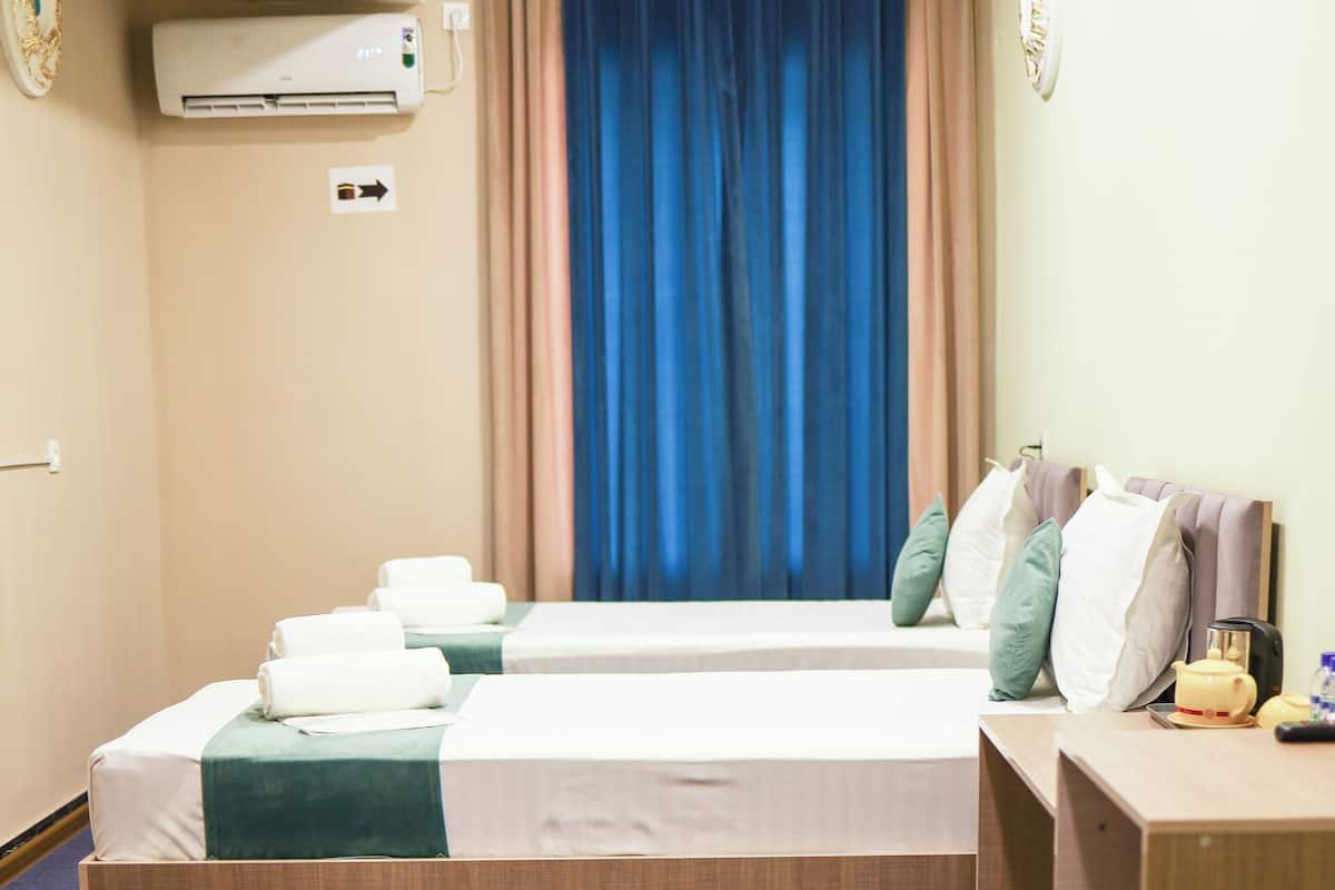 Shower, free toiletries, hair dryer, slippers