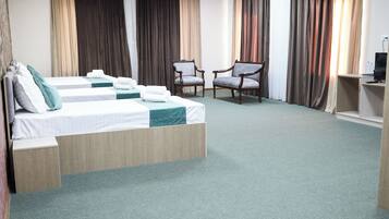 Family Room | 1 bedroom, laptop workspace, blackout curtains, iron/ironing board