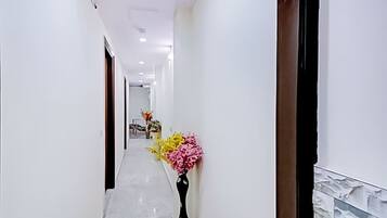 Deluxe Double Room | Living area | 36-inch LED TV with digital channels, offices