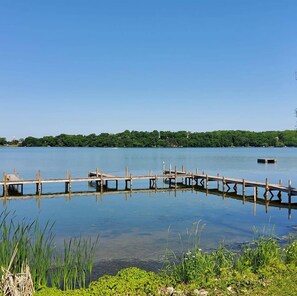 Little Green Lake access just across the street, swim, kayak, fish, or relax on the sandy beach.