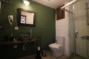 Shower, rainfall showerhead, bidet, towels