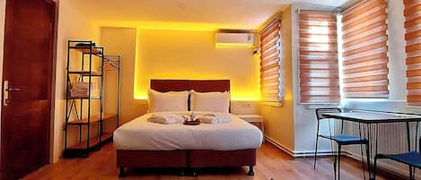 Suite Familiale, 1 grand lit et 1 canapé-lit, non-fumeurs, cuisine | 1 chambre, draps en coton égyptien, literie de qualité supérieure