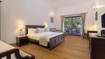 Garden View Suite Room | Minibar, individually decorated, individually furnished, desk