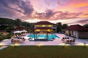 Outdoor pool, open 7:00 AM to 7:00 PM, sun loungers