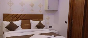 Roomshala 061 NK Residency