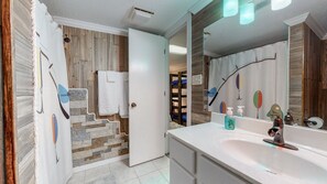 Shower, hair dryer, towels