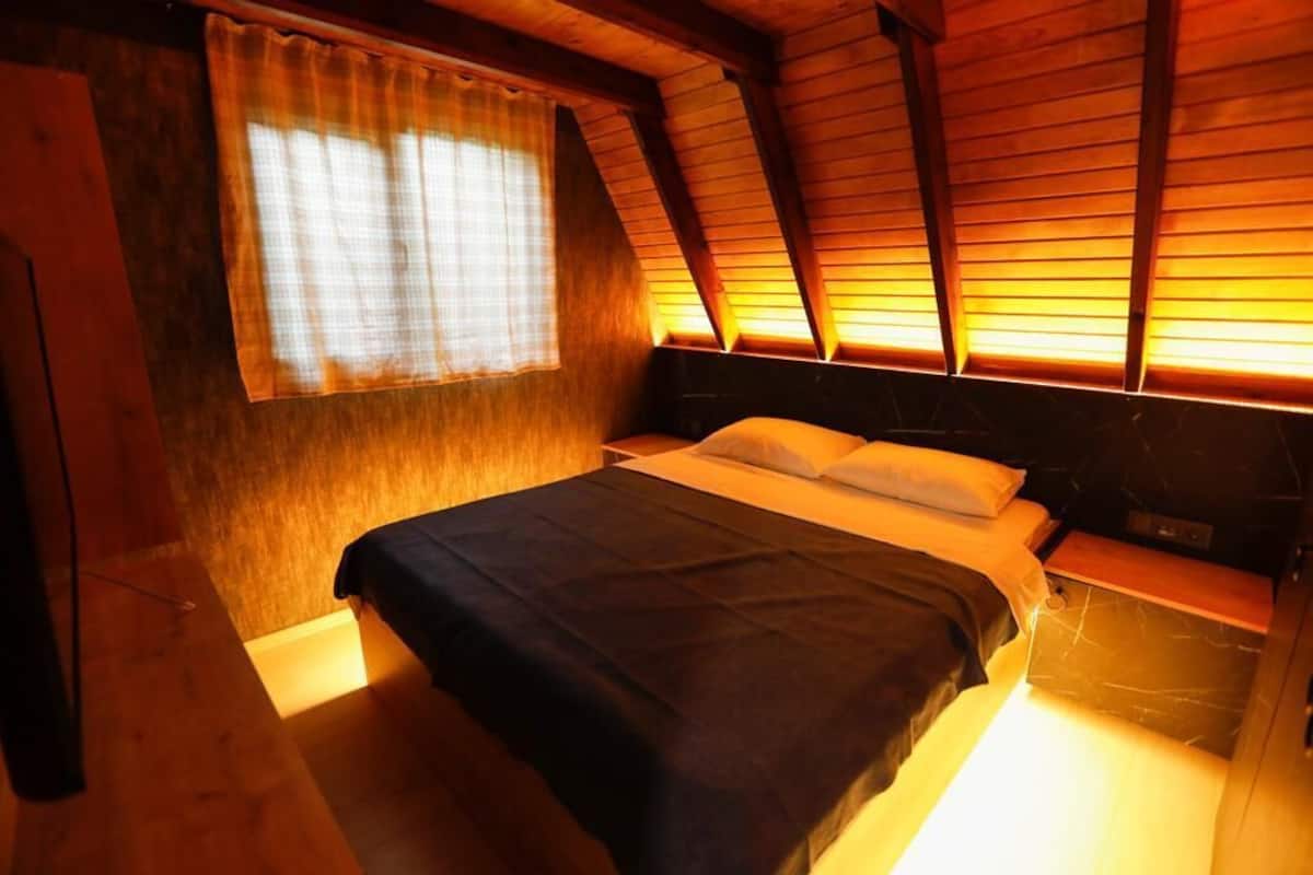 2 habitaciones, minibar y caja de seguridad en la habitación