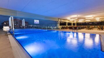 Seasonal outdoor pool, pool umbrellas, pool loungers