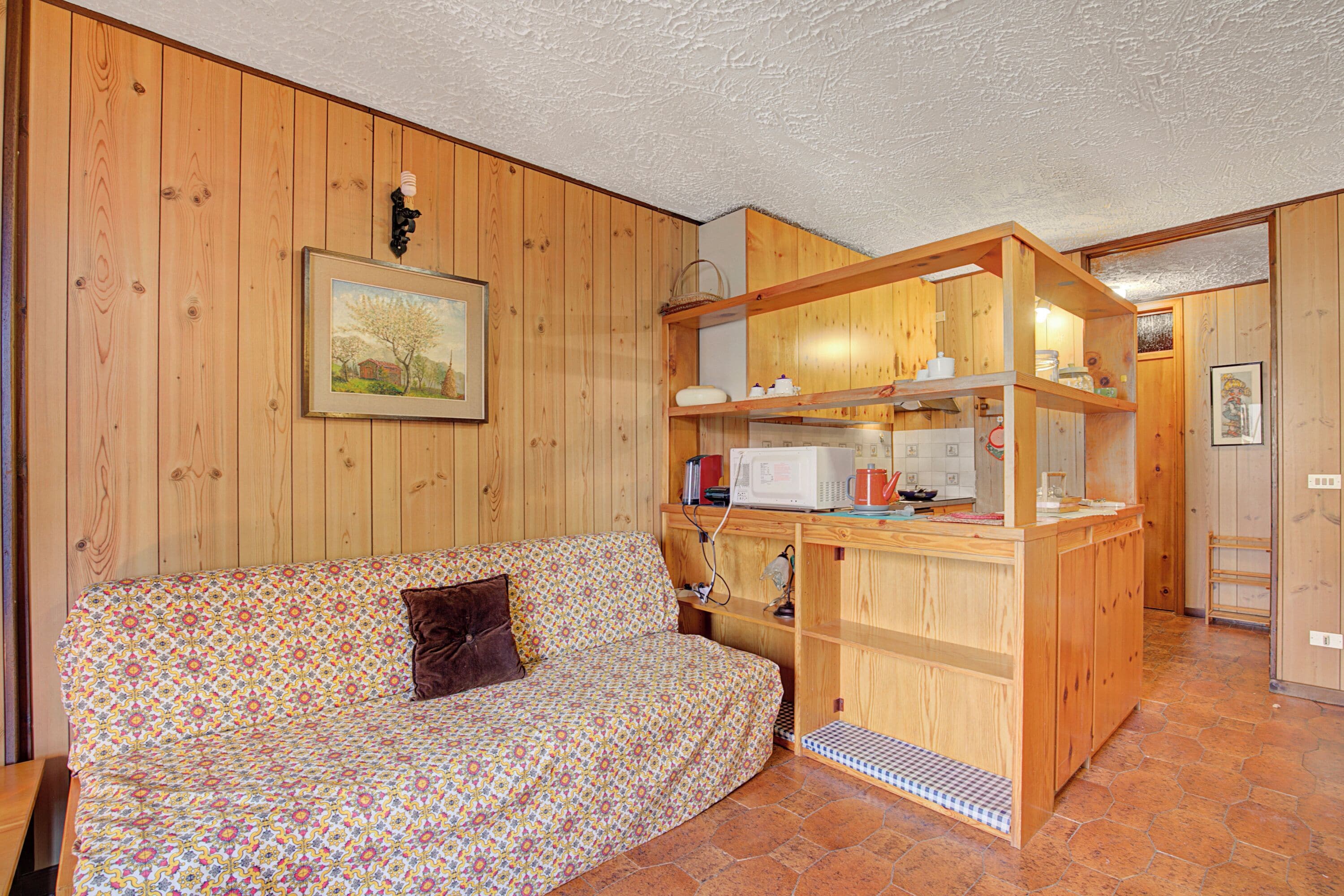 Familienapartment, Mehrere Schlafzimmer (Appartamento Bareu Mountain View) | Wohnzimmer | 21-Zoll-Fernseher mit Digitalempfang