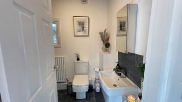 Hair dryer, towels, soap, shampoo
