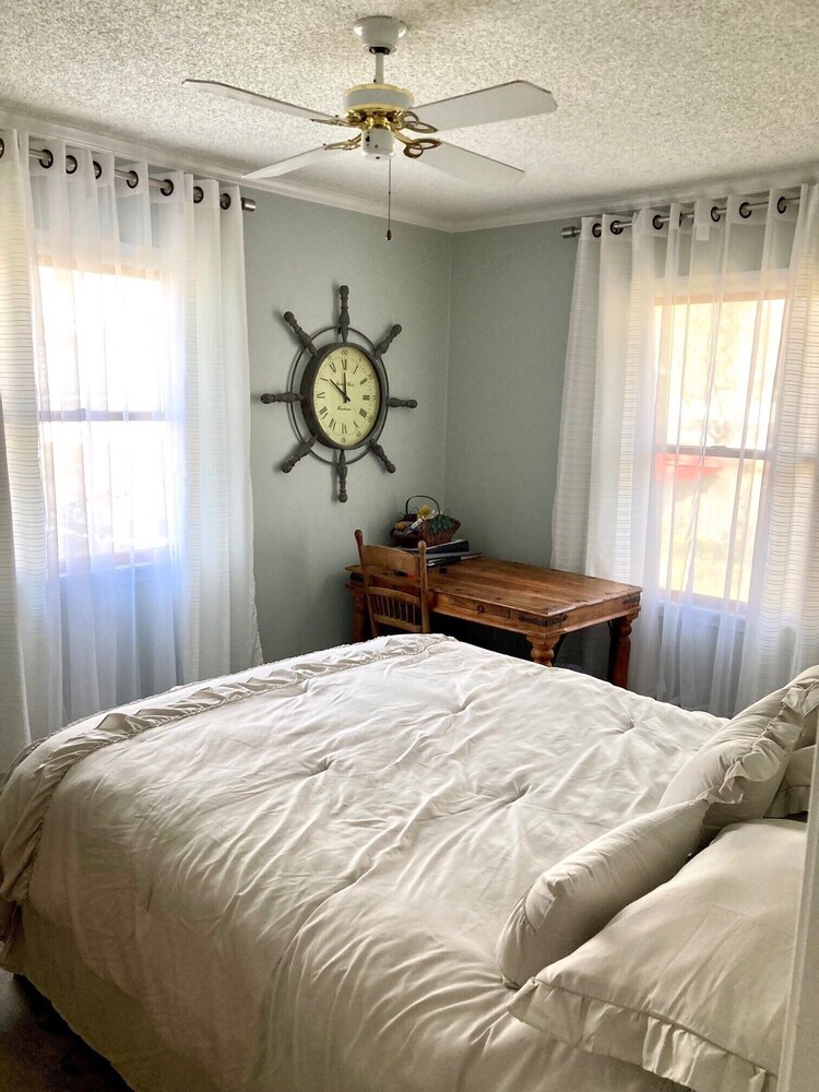 4 bedroom, 2 bath home with covered deck, firepit, fenced yard pet friendly! Sussex County