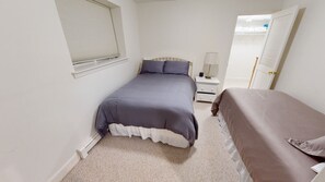 2 bedrooms, desk, iron/ironing board, travel crib