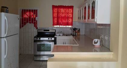 5 minutes walk to the capitol, Kingstown. Gym is one minute walk away.